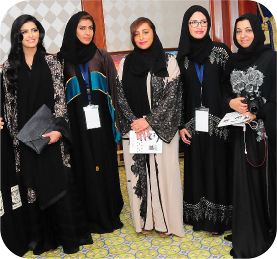 Women leaders exchanging a crystal award